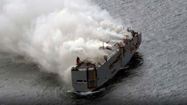Dutch authorities delay plan to tow burning cargo ship